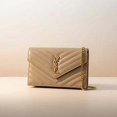 Saint Laurent Envelope chain wallet bag in quilted grained leather with YSL monogram and removable chain strap