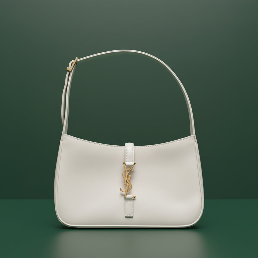 Saint Laurent Le 5 à 7 hobo shoulder bag in smooth leather with gold-tone YSL monogram and adjustable strap