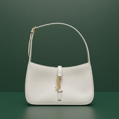 Saint Laurent Le 5 à 7 hobo shoulder bag in smooth leather with gold-tone YSL monogram and adjustable strap