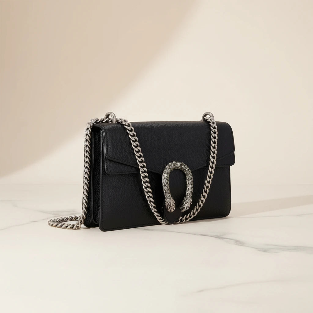 Gucci Dionysus small shoulder bag in black leather with antique silver tiger head closure, front view