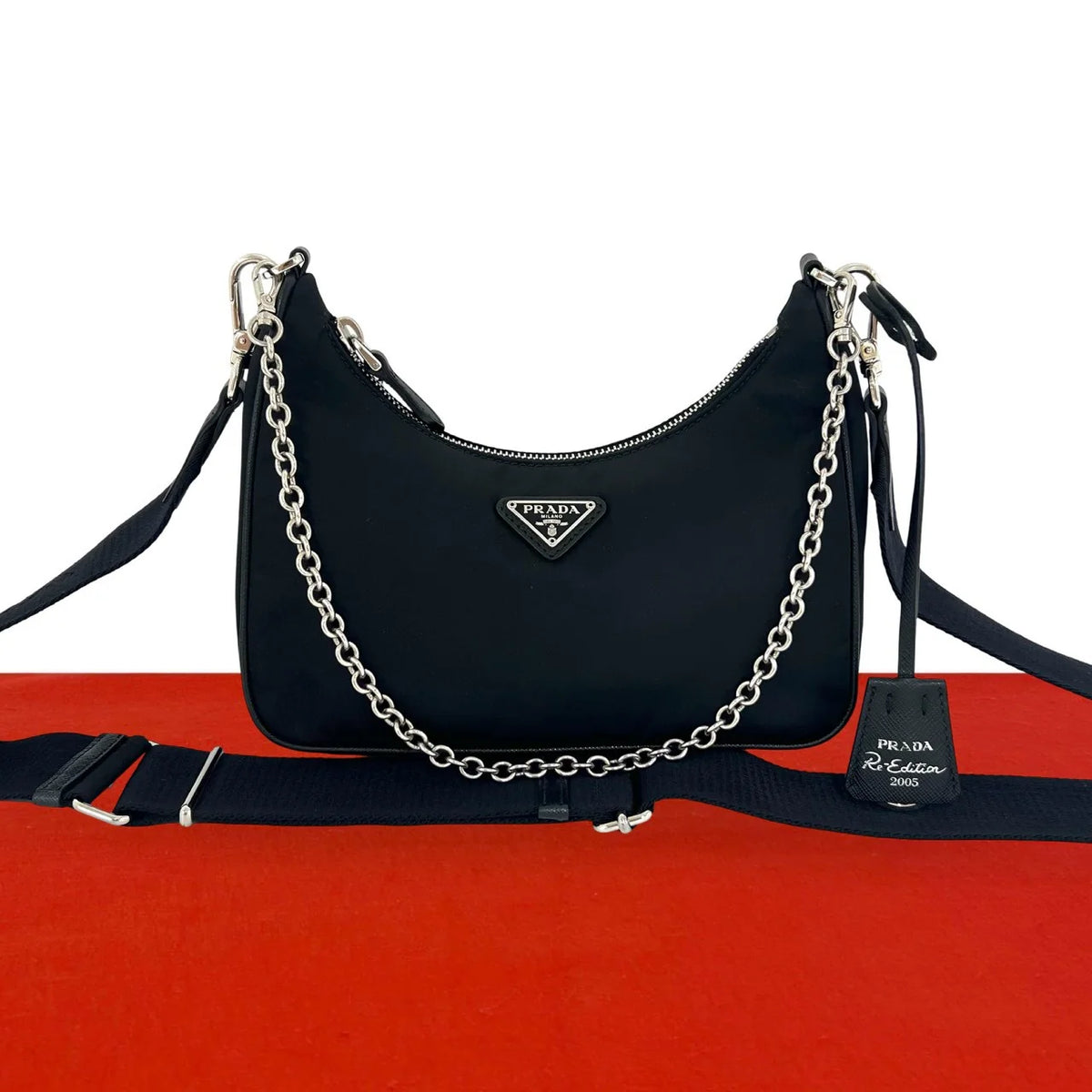 Prada Re-Edition 2005 Re-Nylon shoulder bag with chain strap, enamel triangle logo and detachable mini pouch